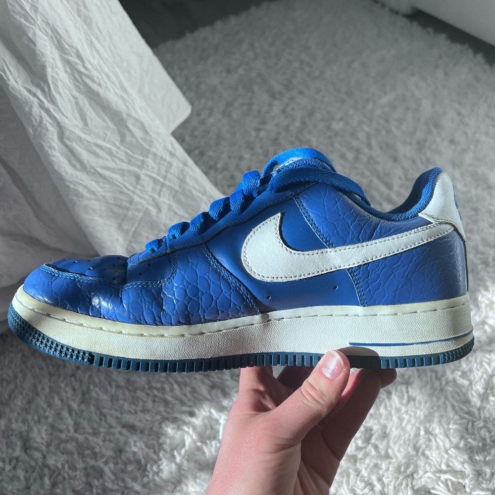 Women’s size 8 Blue leather Nike Air Force 1s.